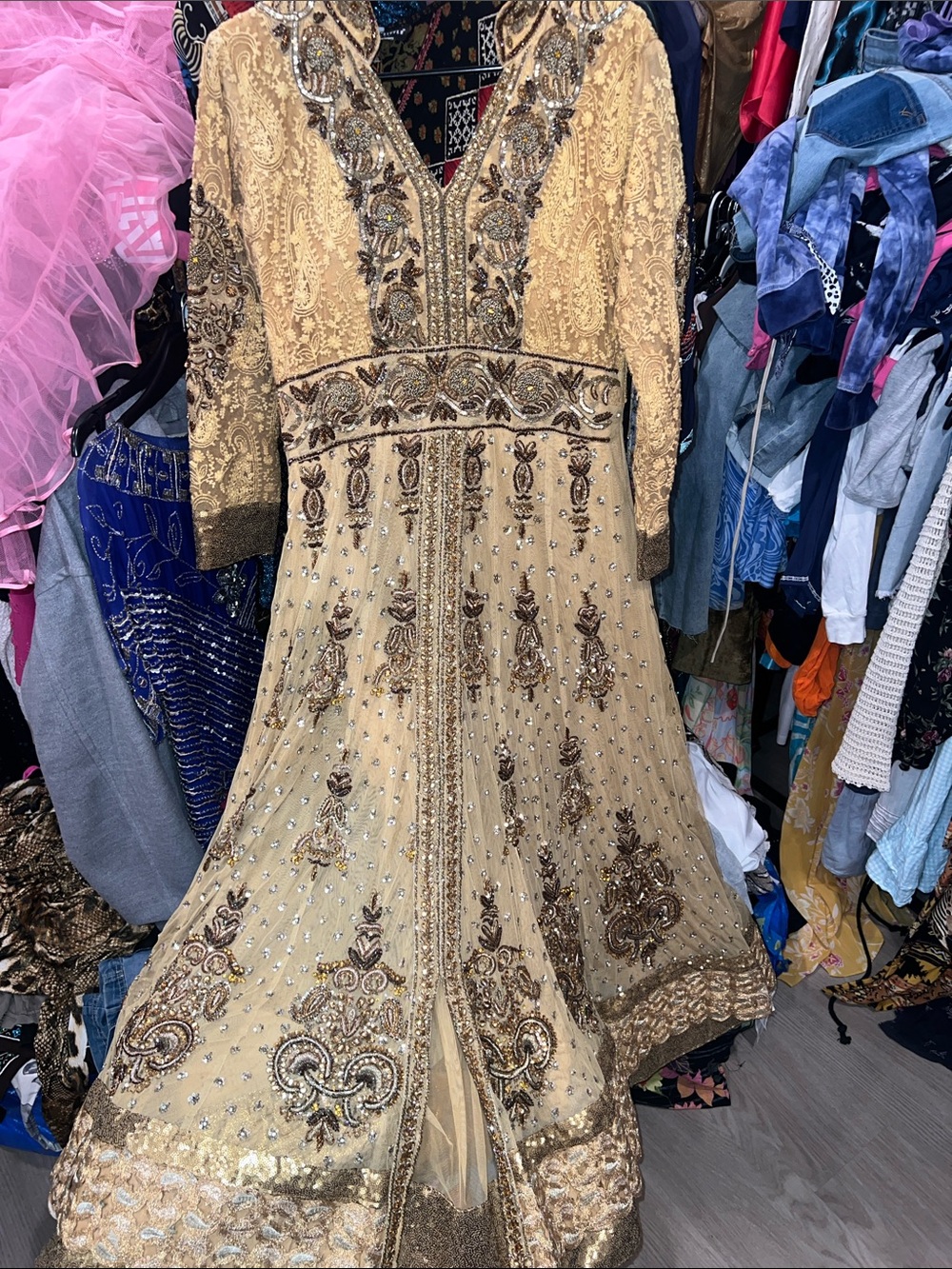 Embroidered and fully beaded iridescent gold Long Sleeve Pakistani wedding gown
